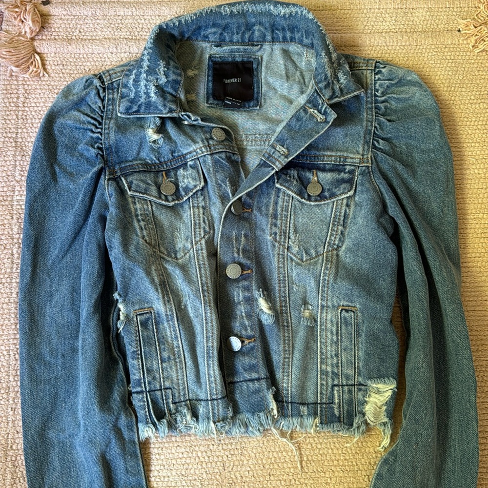 Distressed denim jacket